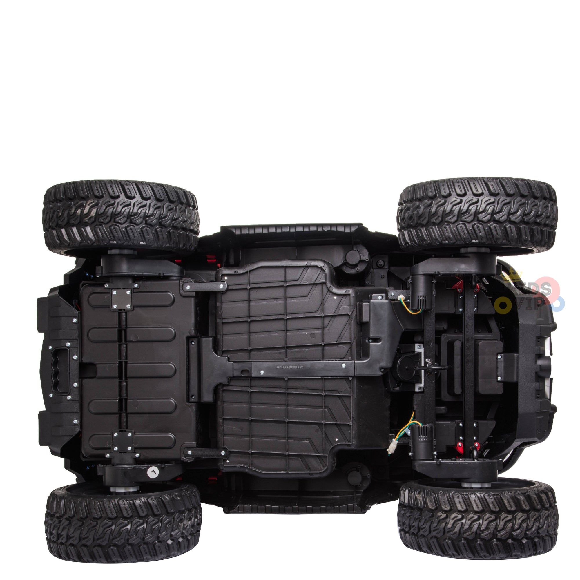 An underside view of the Upgraded 12V Junior Sport Utility Ride On Buggy/UTV 4WD Edition shows off its detailed black chassis, four large textured tires, visible wiring, mechanical structure, and battery compartments.