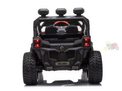 Rear view of a black Upgraded 12V Junior Sport Utility Ride On Buggy with rugged tires, roll bar, and mounted lights. Features include a striking red steering wheel visible from the back and the Kids VIP logo on the right for added style.