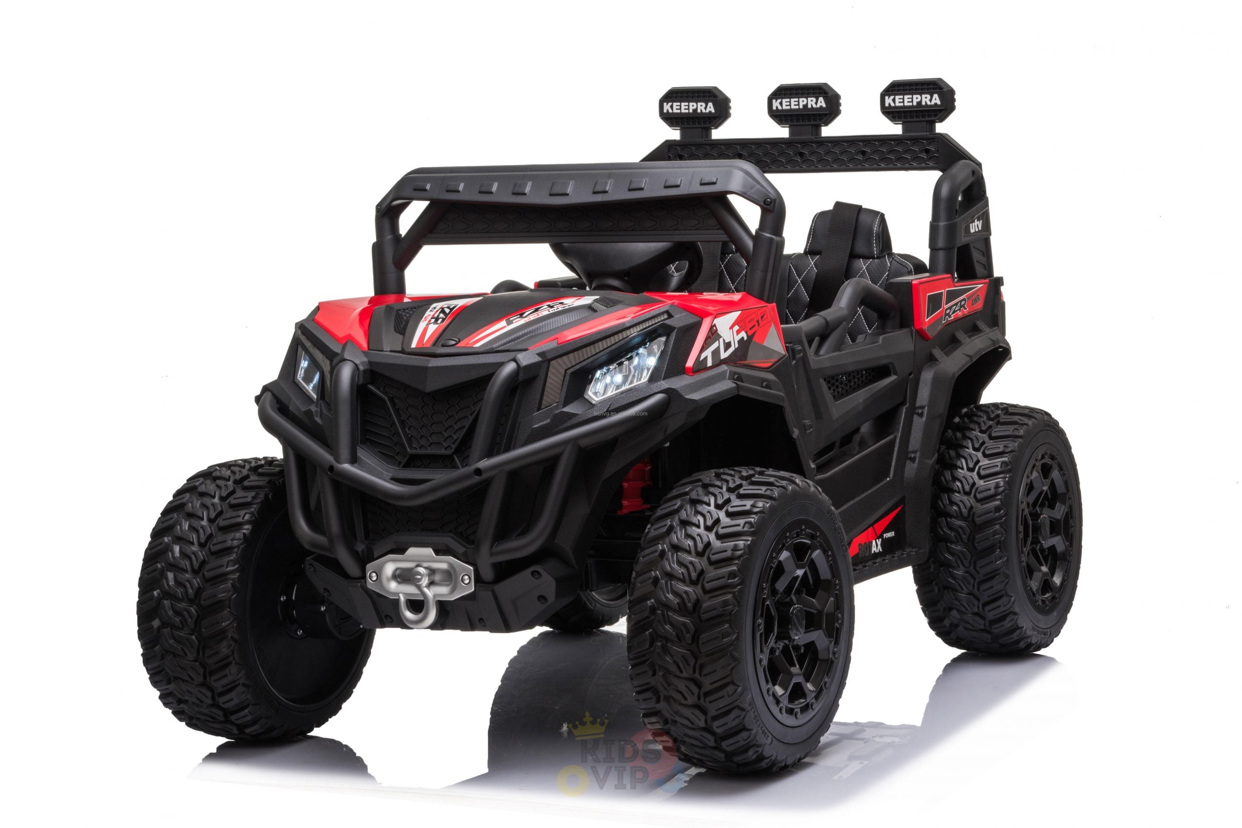 The Upgraded 12V Junior Sport Utility Ride On Buggy/UTV 4WD Edition has a black and red design with large rugged tires, roof lights printed with KEEPPA, and features headlights and a grille for an ATV look. Perfect for thrilling backyard adventures!.