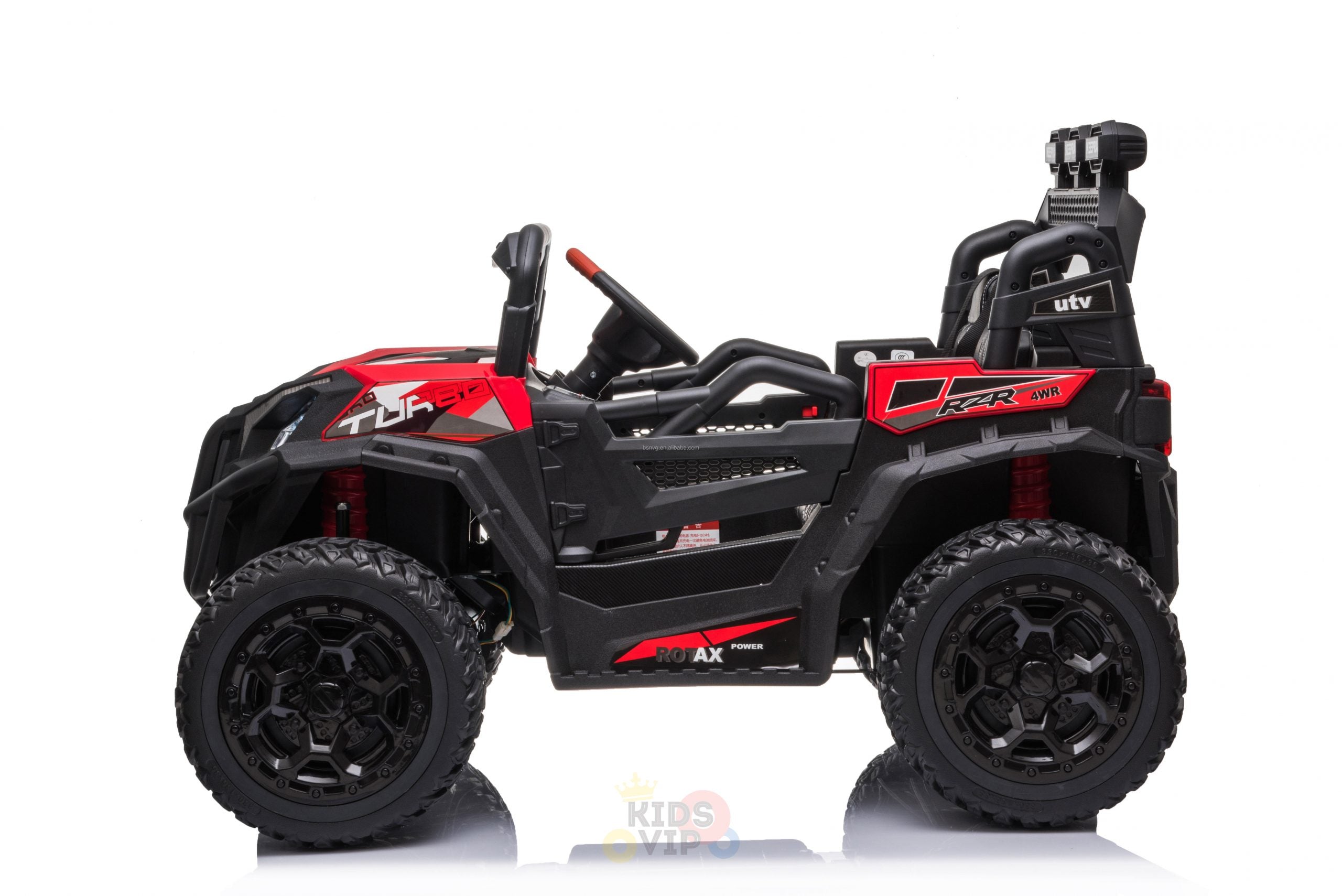 The Upgraded 12V Junior Sport Utility Ride On Buggy/UTV 4WD Edition features red and black graphics, four large wheels, a realistic steering wheel, and side mirrors. Its designed for children and showcased against a plain white background.