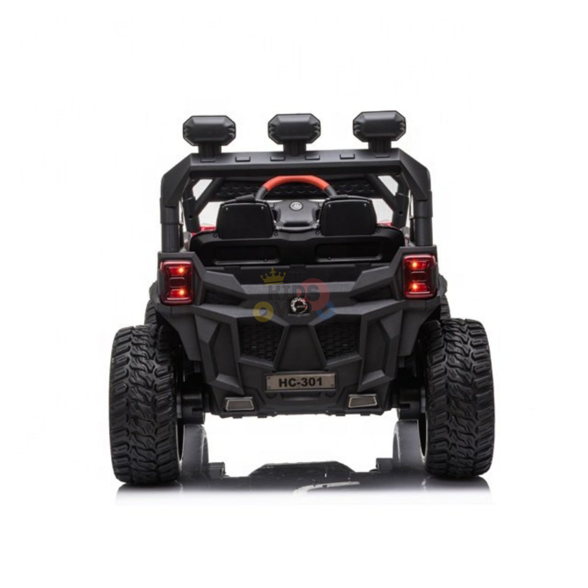 The rear view of an upgraded 12V Junior Sport Utility Ride On Buggy/UTV 4WD Edition displays large tires, overhead lights, and a steering wheel through the open top. The sleek black design with HC-301 on its plate stands out against the white backdrop, making it a remarkable toy vehicle.
