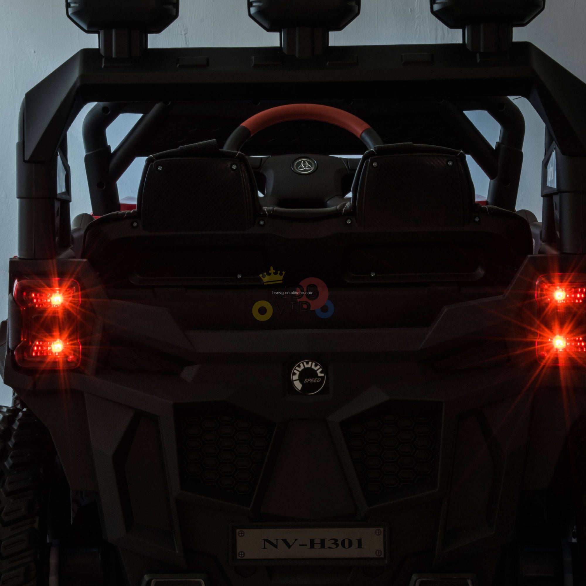 Rear view of a black 12V Junior Sport Utility Ride On Buggy, resembling a rugged SUV. It features bright red taillights, large tires, and a visible steering wheel. The model number NV-H301 is on the rear license plate.