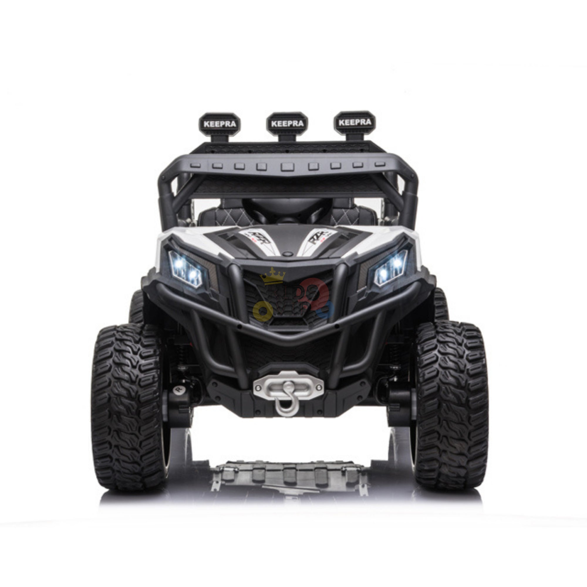 The Upgraded 12V Junior Sport Utility Ride On Buggy/UTV features a rugged design with large tires, sturdy front bumper, LED headlights, and KEEPPA on three roof lights. It has a sleek black and silver finish with a decorative grille and includes parental remote control for safety.