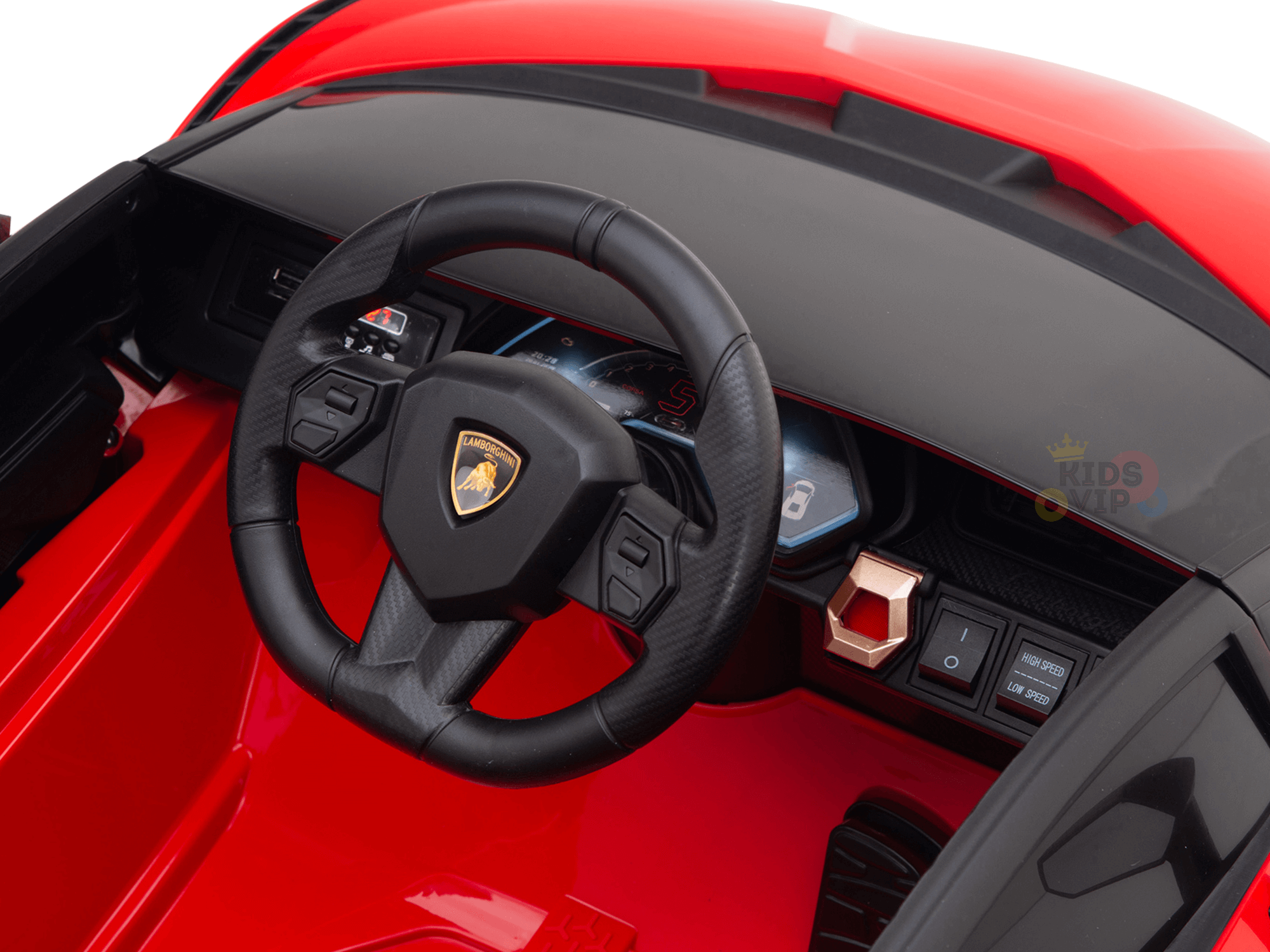 Detailed interior view of the Red Official 12V Sport Edition Lamborghini Sian Kids and Toddlers Ride On Car, showcasing a black steering wheel with logo, digital dashboard, control buttons, and realistic butterfly doors that emulate a luxury sports car.