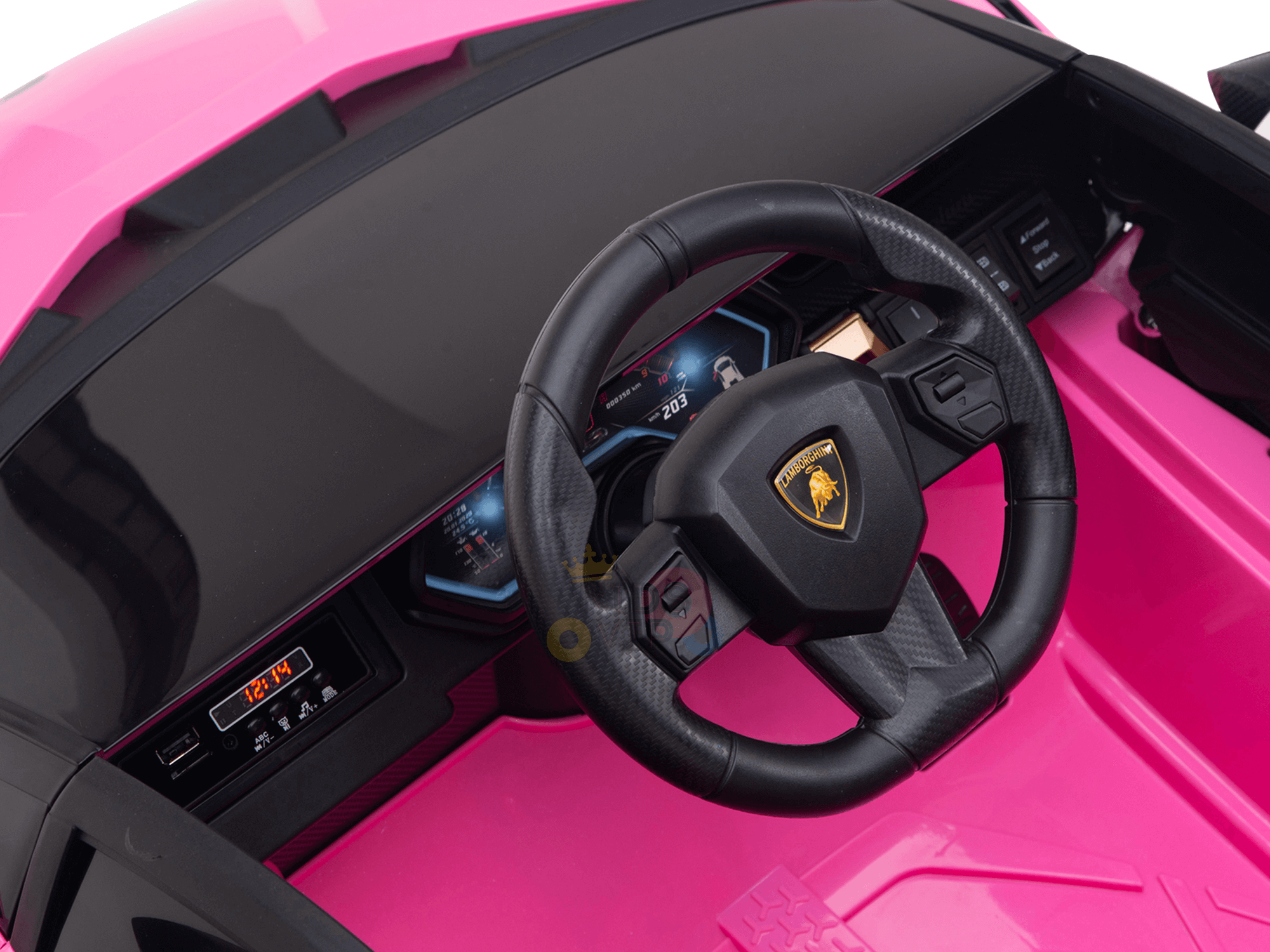 The Official 12V Sport Edition Lamborghini Sian Kids and Toddlers Ride On Car features a pink body, sleek black dashboard, Lamborghini emblem on the steering wheel, and digital readouts with glowing blue details for an authentic feel.